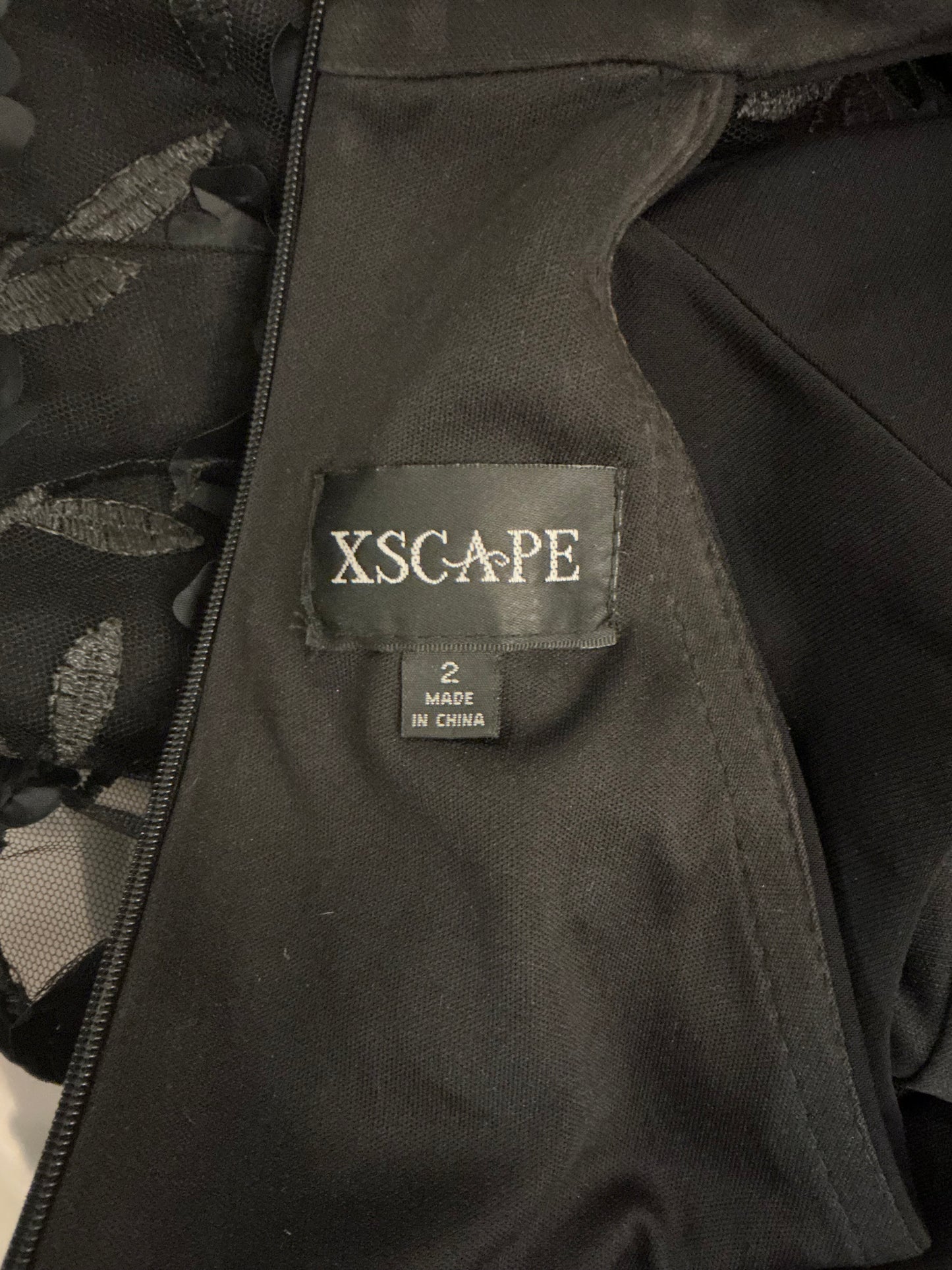 XSCAPE Black Halter Cocktail Dress with 3D Floral Skirt – Size 2